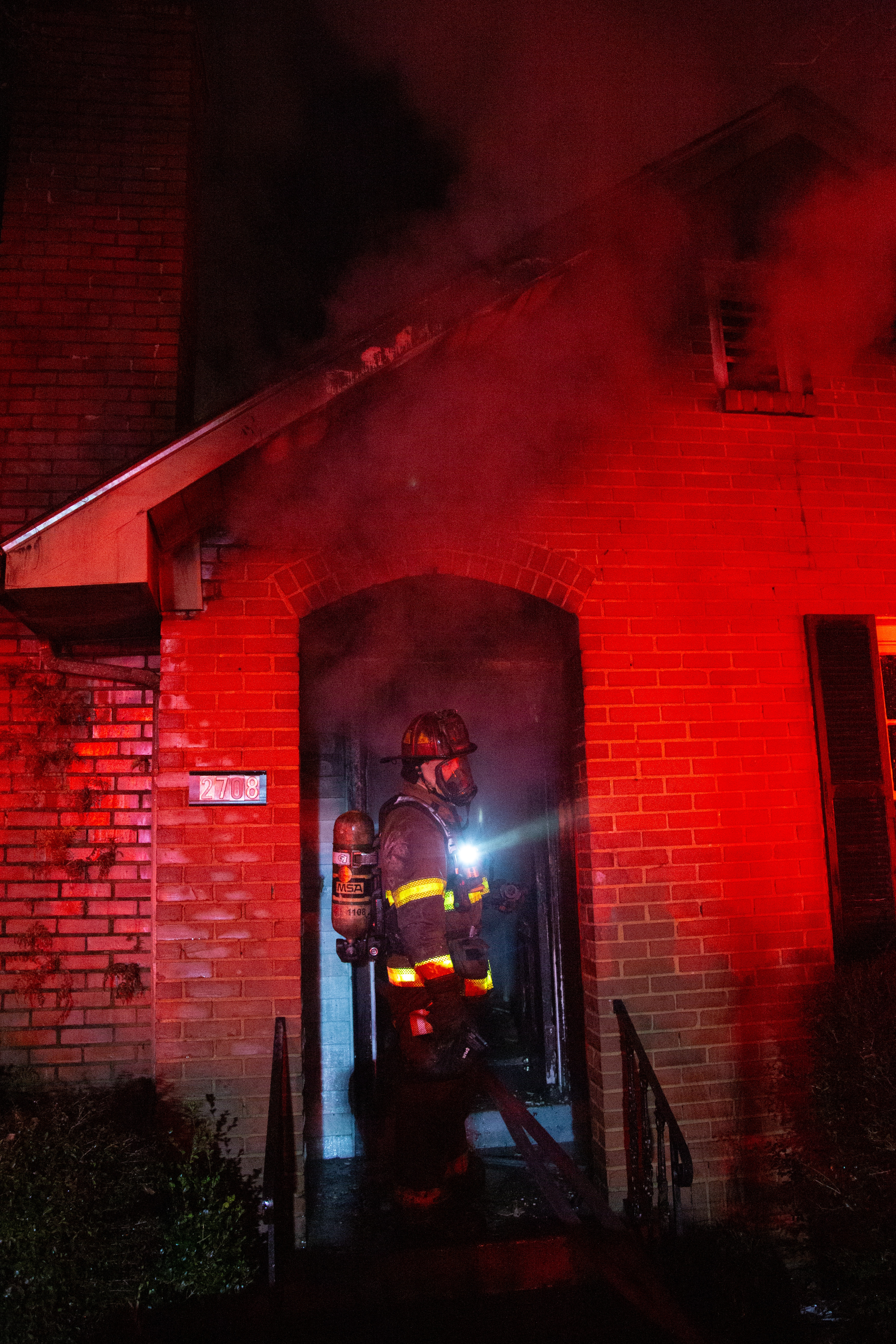 Firefighters Work at Residential Fire